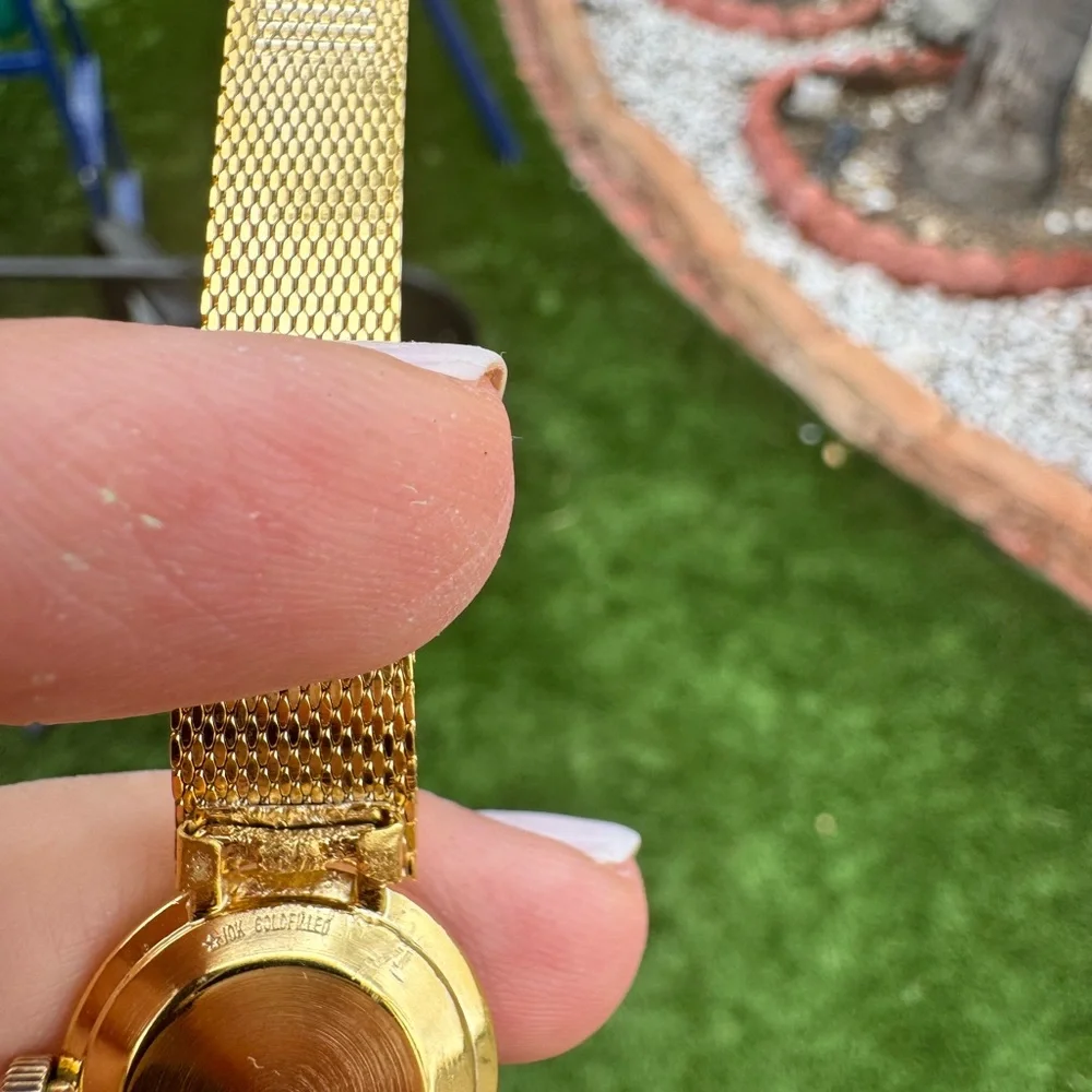 Bulova Women's Gold-Tone Mesh Bracelet Watch with Black Dial
